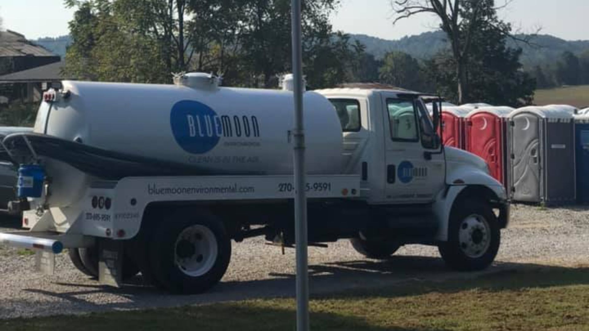 Blue Moon Environmental truck with Portable Toilets